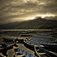 Buy canvas prints of  Boats of Phewa Lake, Pokhara, Nepal by Julian Bound