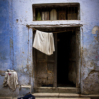 Buy canvas prints of The Streets of Old Town Varanasi, Varanasi, India by Julian Bound