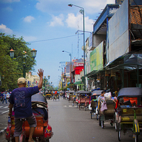 Buy canvas prints of  Rickshaw driver of Yogyakarta, Indonesia by Julian Bound
