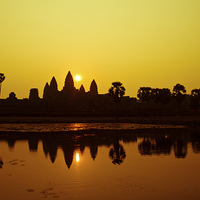 Buy canvas prints of Sunrise over Angkor Wat, Siem Reap, Cambodia by Julian Bound