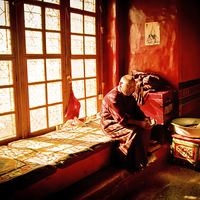 Buy canvas prints of Elederly Tibetan Buddhist monk of Lhasa, Tibet by Julian Bound