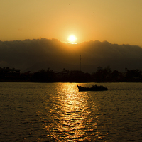 Buy canvas prints of Sunset in Kampot, Cambodia by Julian Bound