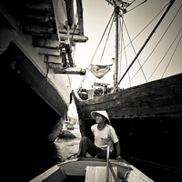 Buy canvas prints of Sailor, Sunda Kelapa harbour Jakarta, Indonesia by Julian Bound