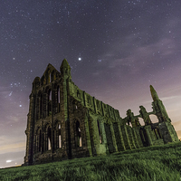 Buy canvas prints of  Whitby Abbey at Night Under the Stars by Stephen Beardon