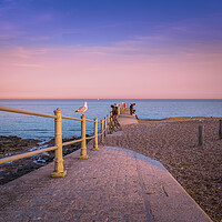 Buy canvas prints of Enjoying the sunset in Hastings. by Bill Allsopp