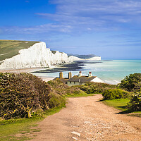 Buy canvas prints of The Coastguard Cottages and the Seven Sisters Cliffs. by Bill Allsopp