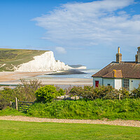 Buy canvas prints of The Coastguard Cottages and the Seven Sisters. by Bill Allsopp