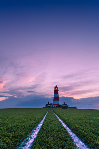 Happisburgh Lighthouse at sunset. Picture Board by Bill Allsopp