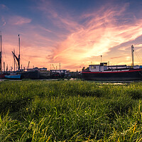 Buy canvas prints of Sunrise over sailing barges by Bill Allsopp