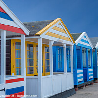 Buy canvas prints of Beach huts panorama. by Bill Allsopp