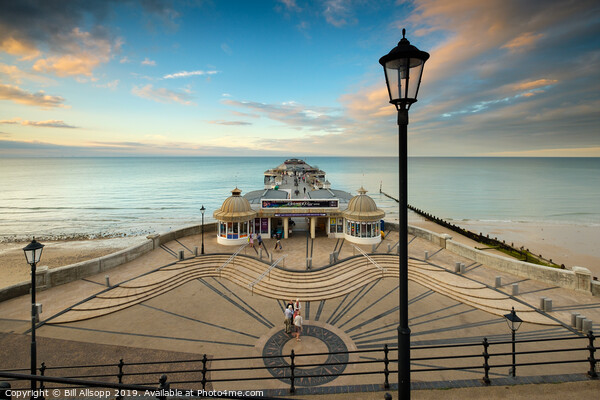 Cromer Pier at Sunset. Picture Board by Bill Allsopp