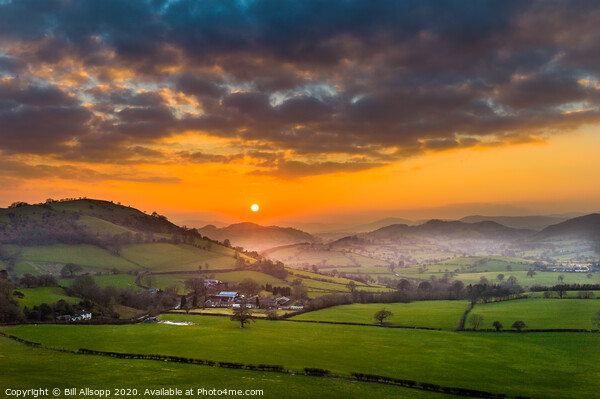 Sunset over the Berwyn mountains Picture Board by Bill Allsopp
