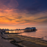 Buy canvas prints of Cromer pier at sunset. by Bill Allsopp