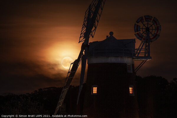 Cley windmill and harvest moon at night in Norfolk Picture Board by Simon Bratt LRPS