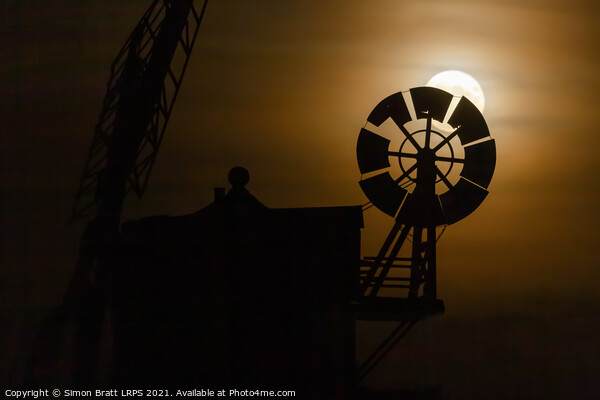 Cley windmill silhouette with full moon fantail Picture Board by Simon Bratt LRPS