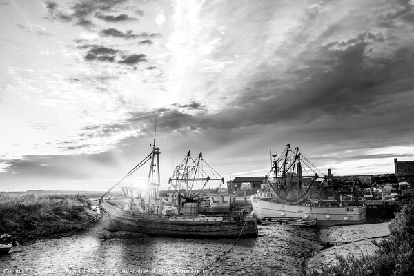 Brancaster Norfolk fishing trawlers at sunrise BW Picture Board by Simon Bratt LRPS