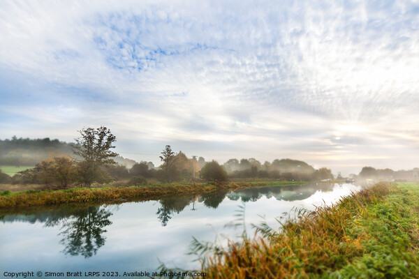 North Walsham Dilham Canal in Norfolk sunrise Picture Board by Simon Bratt LRPS