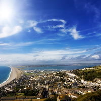 Buy canvas prints of View over British seaside town and coastline by Simon Bratt LRPS