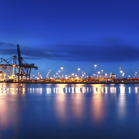 Buy canvas prints of Marchwood Hampshire container port and sea at dusk by Simon Bratt LRPS