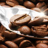 Buy canvas prints of Coffee beans close up on a spoon with sunlight ref by Simon Bratt LRPS