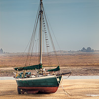 Buy canvas prints of Sail boat stranded at low tide on sand by Simon Bratt LRPS