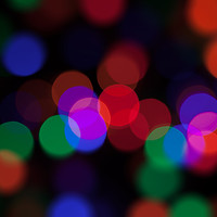 Buy canvas prints of Large coloured party lights at night by Simon Bratt LRPS