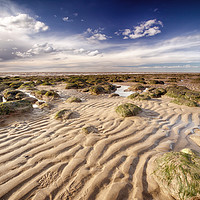 Buy canvas prints of Hunstanton golden sand lines and seaweed rocks of  by Simon Bratt LRPS