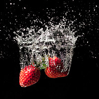 Buy canvas prints of Strawberry fruit big splash into water by Simon Bratt LRPS