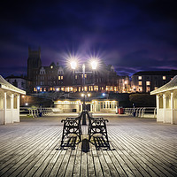 Buy canvas prints of Cromer pier Norfolk at night looking towards town by Simon Bratt LRPS