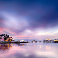 Buy canvas prints of Famous Cromer pier in Norfolk England with pink su by Simon Bratt LRPS