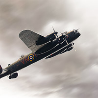 Buy canvas prints of Lancaster bomber close up fly past by Simon Bratt LRPS