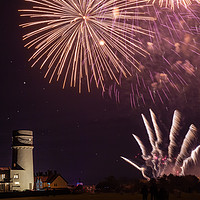 Buy canvas prints of Bonfire night foreworks over lighthouse in Norfolk by Simon Bratt LRPS