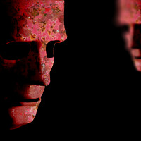 Buy canvas prints of Two red rusting old decaying robot faces by Simon Bratt LRPS