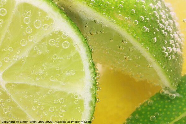 Lemon and lime slices in water Picture Board by Simon Bratt LRPS
