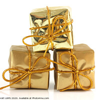 Buy canvas prints of Three gold Christmas parcels by Simon Bratt LRPS