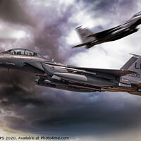 Buy canvas prints of Two F-15E fighter jets passing in storm clouds by Simon Bratt LRPS