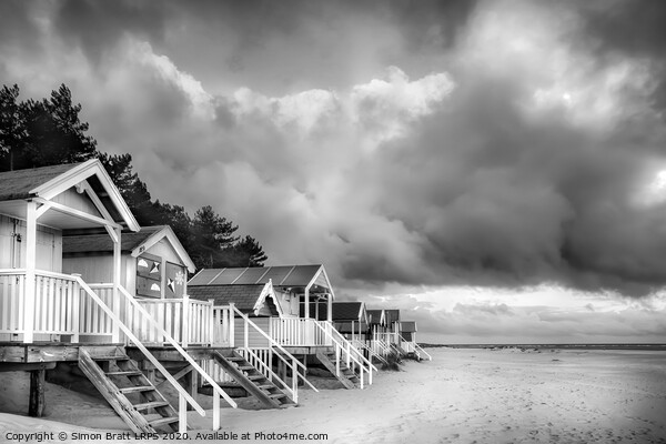 Wells next The Sea Beach huts in black and white on sandy coast Picture Board by Simon Bratt LRPS