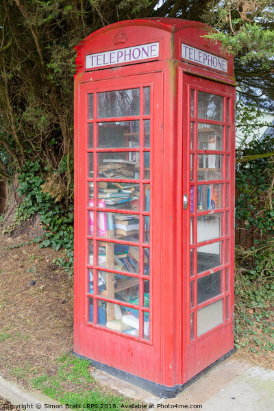 Red telephone box as a mobile library Picture Board by Simon Bratt LRPS