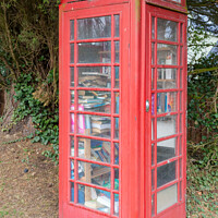 Buy canvas prints of Red telephone box as a mobile library by Simon Bratt LRPS