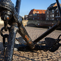 Buy canvas prints of Quay side anchor and chains in Norfolk by Simon Bratt LRPS