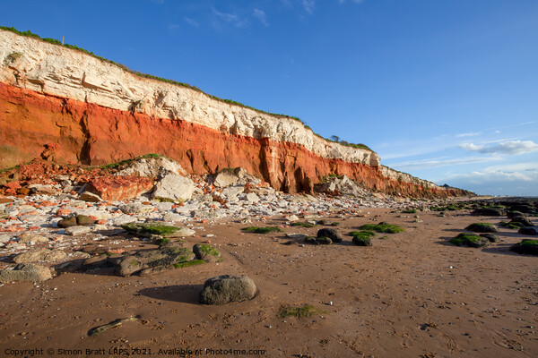 Red rock cliffs on Hunstanton beach Norfolk UK Picture Board by Simon Bratt LRPS
