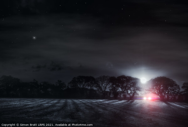 Lone driver in a dark field Picture Board by Simon Bratt LRPS