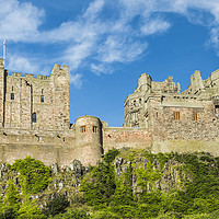 Buy canvas prints of Bamburgh Castle. by Ernie Jordan