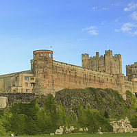 Buy canvas prints of Bamburgh Castle on a August day. by Ernie Jordan