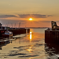 Buy canvas prints of Whitstable harbour view at sunset by Ernie Jordan