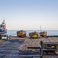 Buy canvas prints of Boats on the Beach by Ernie Jordan