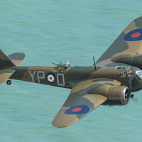 Buy canvas prints of  Bristol Blenheim Mk1 low over the sea by Max Stevens