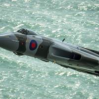 Buy canvas prints of  Vulcan XH558 Spirit of Great Britain low over the by Max Stevens