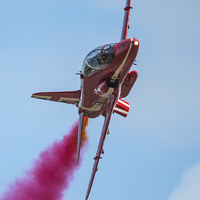 Buy canvas prints of  Red Arrows jet on a knife edge by Max Stevens