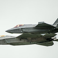 Buy canvas prints of The Lockheed Martin F35 & F22 fly together by Max Stevens